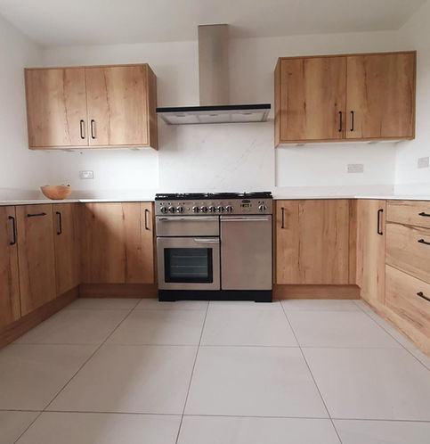 Double-width oven and hob in a new kitchen