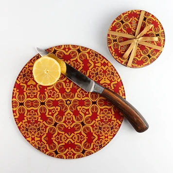 red and gold glass cutting board and coasters