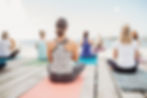 Yoga Students practicing yoga in Carolina Beach, NC