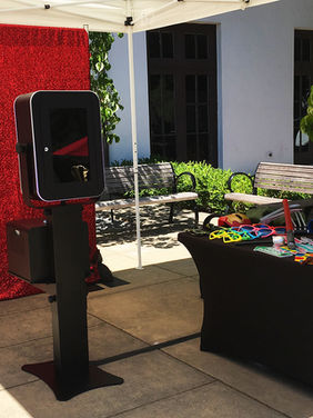 Black LED Booth Red Glitter Backdrop.jpg