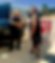 Satisfied customer shaking hands tinted suv.png