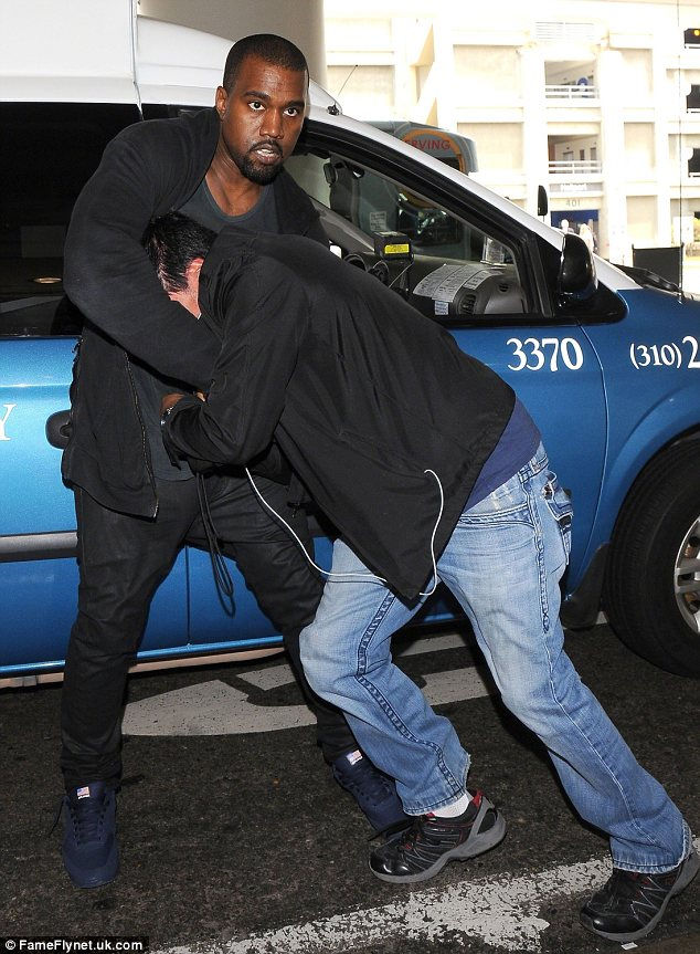 Kanye getting "close" with paparazzi