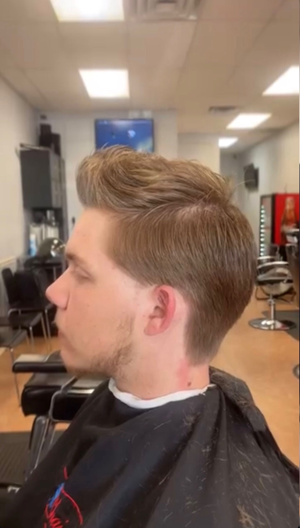 teenage scissor haircut at chair 1 Barber 2026