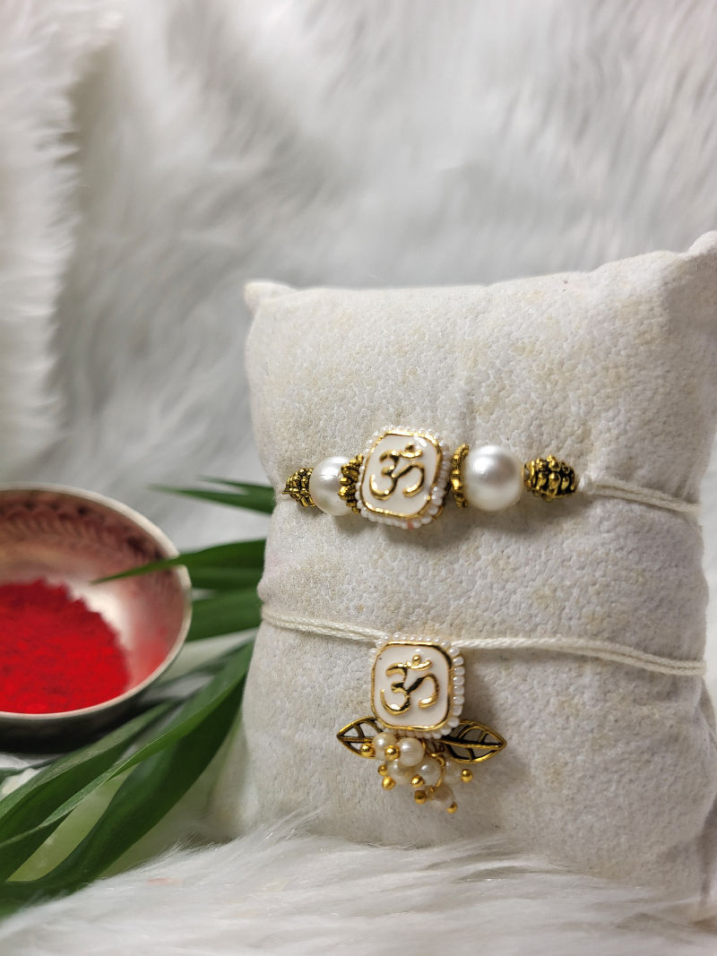 Thumbnail: White Om Kundan_Couple Rakhi