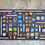 Thumbnail: A modern synthesis with small pieces of wood painted in a very special way. A unique artistic wall art composition.