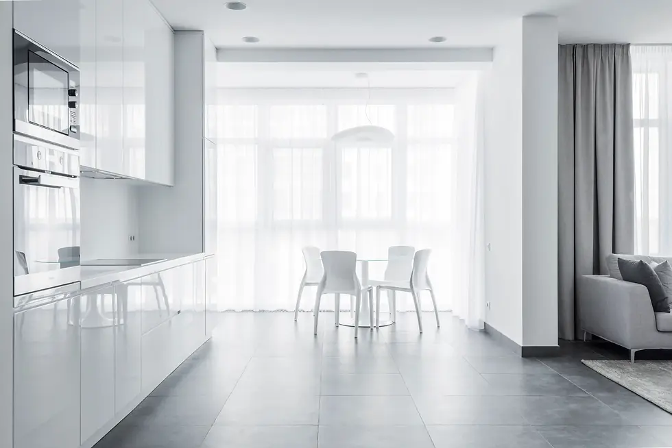 Clean white and grey studio appartment.