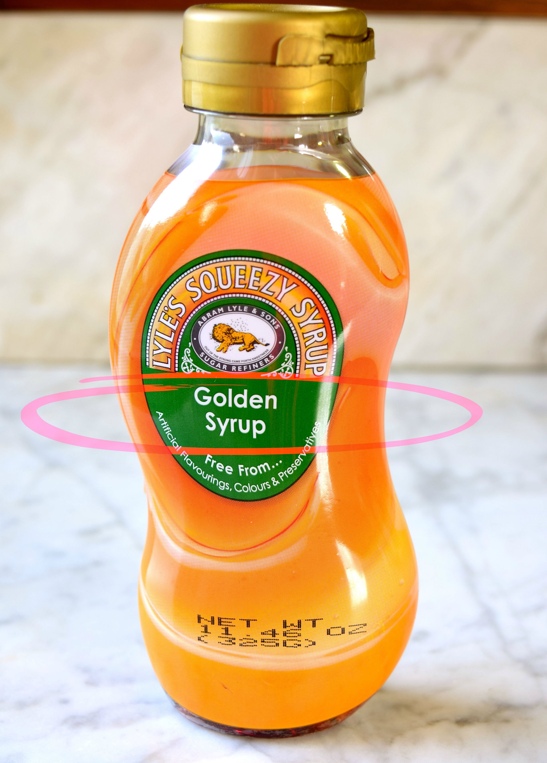 Also referred to as invert sugar cane syrup, invert syrup, inverted syrup,or simply 'invert'. Golden syrup is a medium invert syrup that contains approx 80 percent sugars, being 30-40 sucrose, and 50 invert sugar (25 fructose, 25 glucose). Golden syrup is produced in a sugar refinery from 'Refiners Syrup', which are syrups left over in a refinery after sucrose crystallization. Refiners syrup is treated with acid or enzyme invertase at high temperatures to produce a clear, golden color syrup.