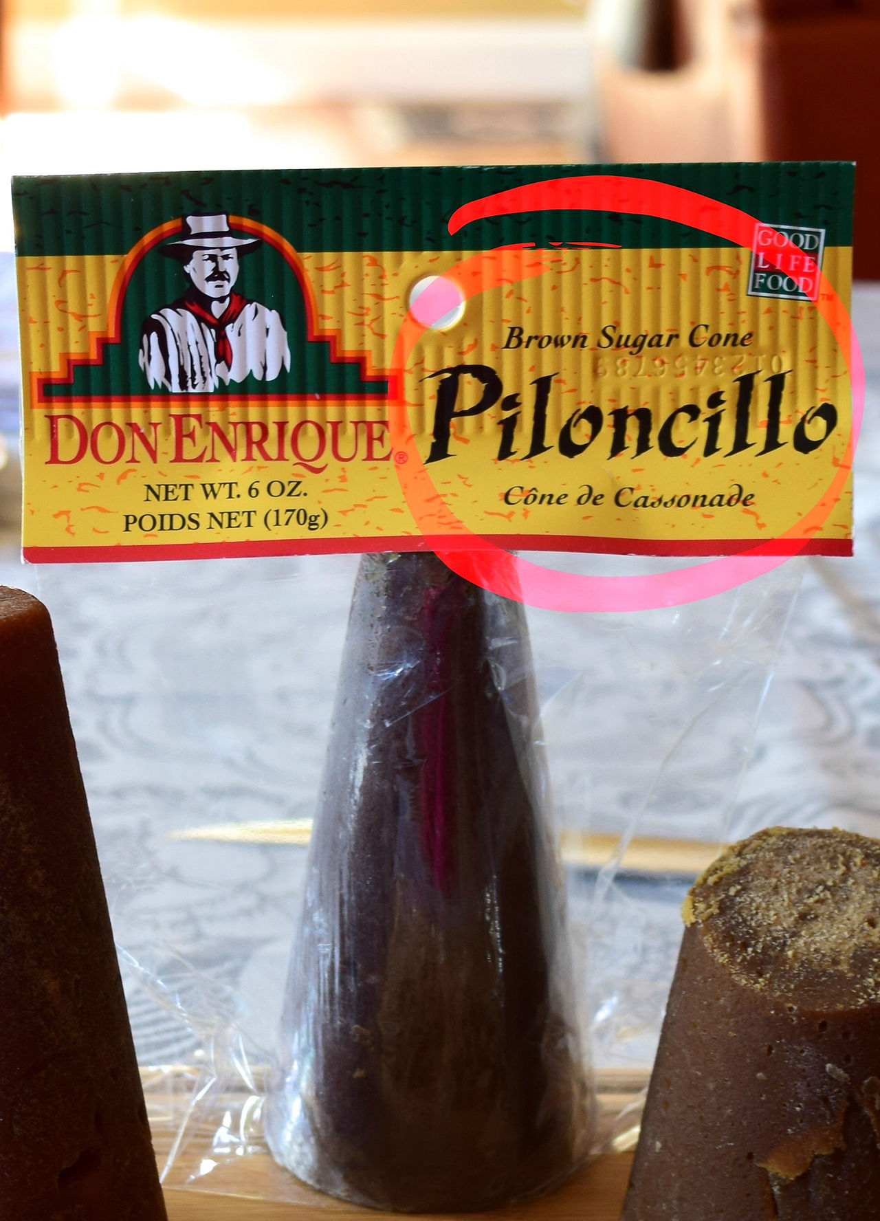 Piloncillo is a traditional brown sugar produced directly from the cane juice in sugars mills in Mexico. Historically, sugars crystals are separated from the molasses by using upright conical pots, and over a period of days, the molasses drains through a hole at the base of the cone, leaving sugar cones.  The disadvantage of the sugar in cone is that they are not so easy to use and dissolve.