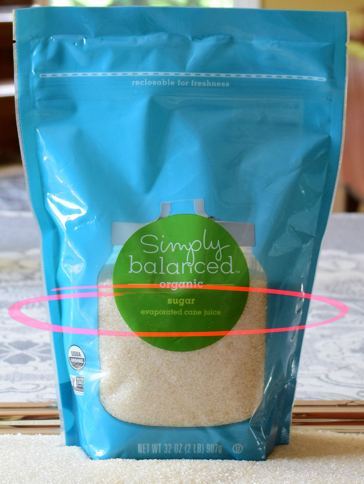 Evaporated cane juice is a raw cane sugar with medium-size crystals and blond color. It is slightly less refined than white sugar but it is much less processed. Has a hint of molasses flavor. It is slightly more moist than white sugars. Is a one-to-one replacement for white sugar. Usually contains 99 percent sugar. 'Evaporated cane juice' is a term that the Food and Drug Administration (FDA) recommends not to be used on food labels as it is not a juice, it is a sugar in granulated form.
