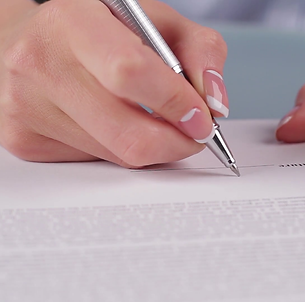 videoblocks-woman-signing-contract-female-employee-signs-rent-contract-beneficial-for-both