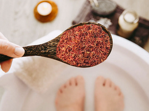 Hong Hua (Safflower) being added to a foot soak