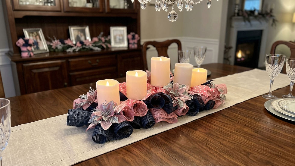 Pink and navy ribbon centerpiece with glowing candles