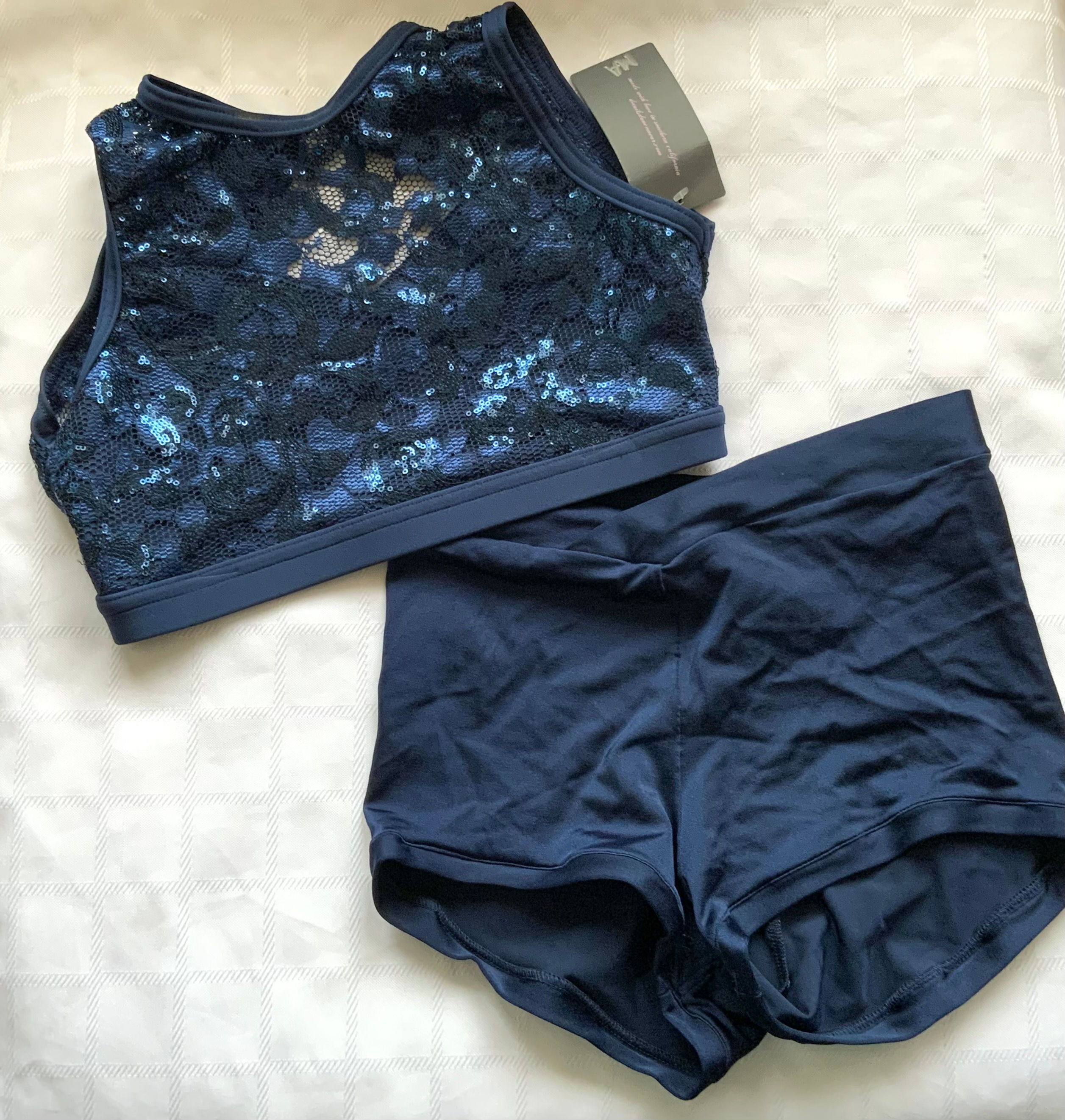 Navy med top/small shorts