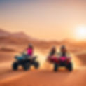 girls riding atv bikes in desert in morning.jpg
