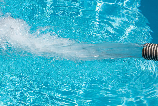 Water pipe filling up swimming pool ..jpg