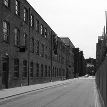 Black and white street photograph in Ancoats