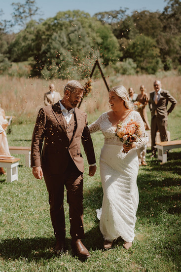 Groom and bride walking.