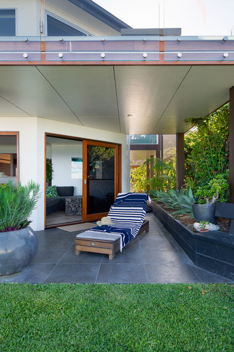 Patio with lounge chair, grass, and outdoor space for relaxing and enjoying