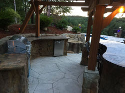 Outdoor kitchen with a pergola