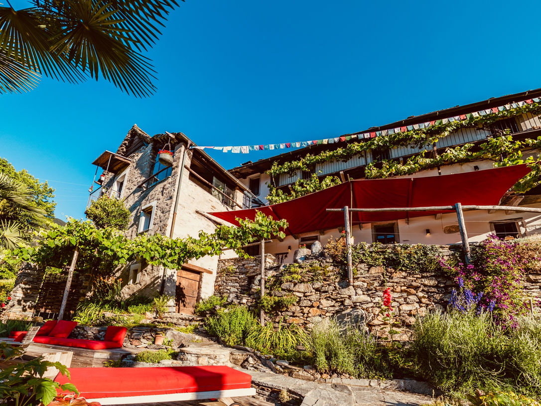 View of the CB Guesthouse from the lower guest terrace; Photo: CB Guesthouse, BnB, Mergoscia