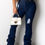 Thumbnail: Mid Waist Ruched Ripped Jeans
