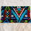Miniature : Pochette africaine en tissu wax aux motifs géométriques multicolores, faite main.