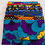 Miniature : Pochette en tissu Wax à motifs floraux colorés, fermée, montrant les fleurs stylisées en bleu turquoise, violet et jaune.
