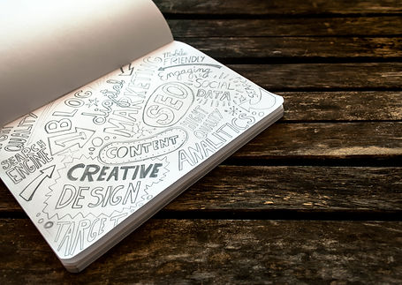 Notebook-with-sketch-of-web-and-Digital-