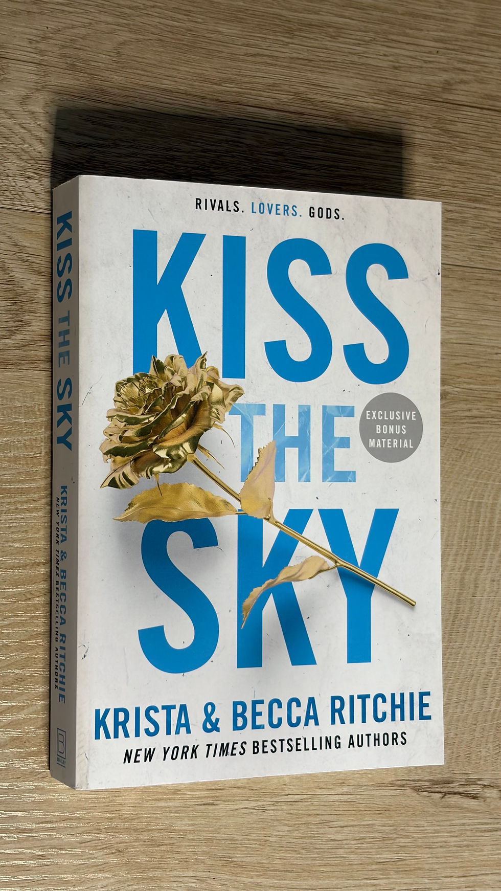 Kiss the Sky book cover with a gold rose.
