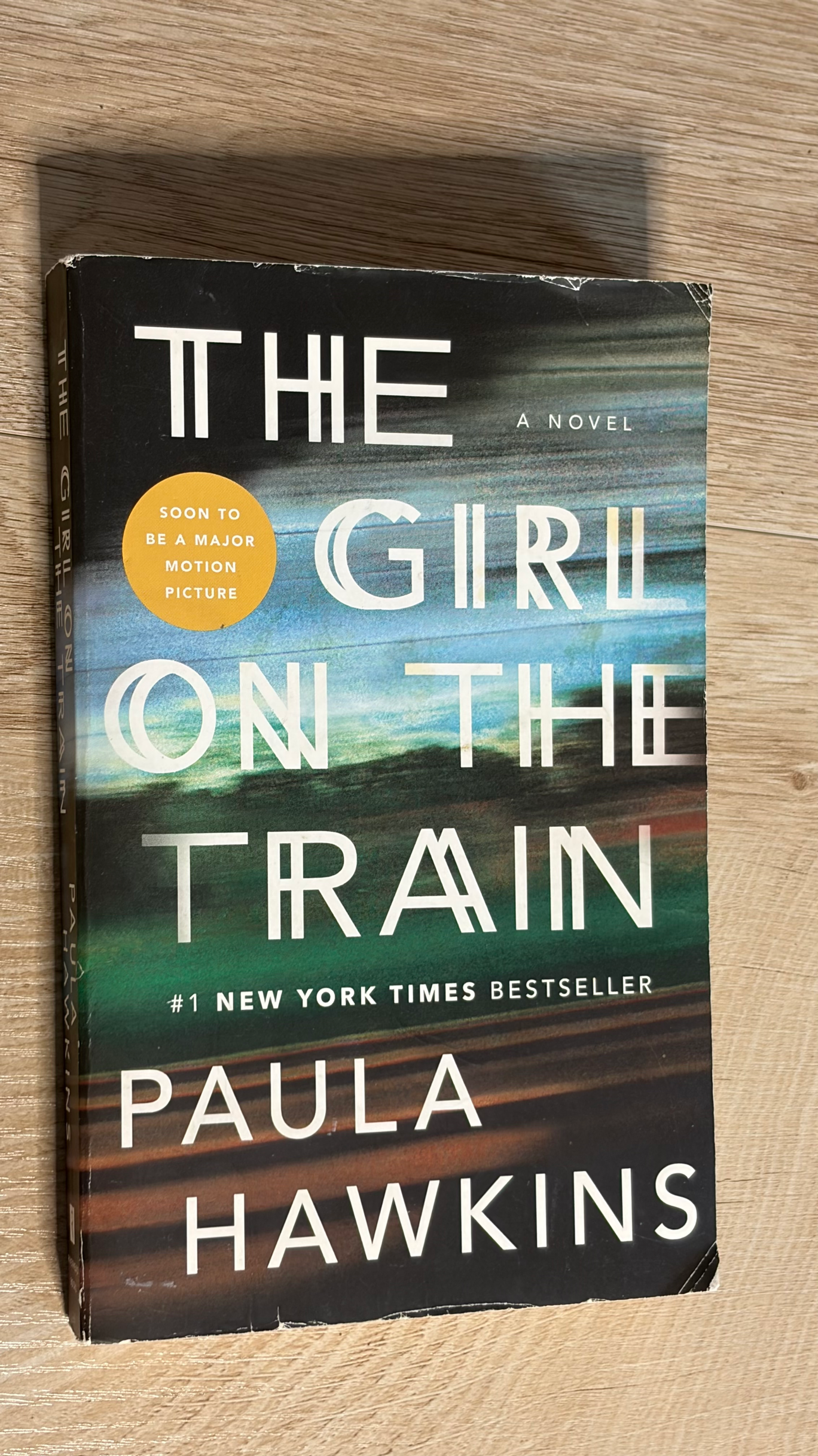 Paperback of The Girl on the Train by Paula Hawkins