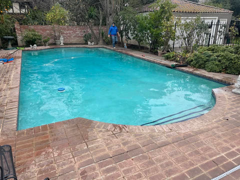 Clear, algae-free water in a residential pool ready for swimming.