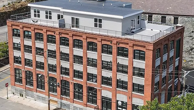 Large, brick apartment building in Woonsocket, Rhode Island