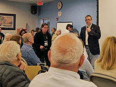 Town Hall Crowd Clapping for Compassion