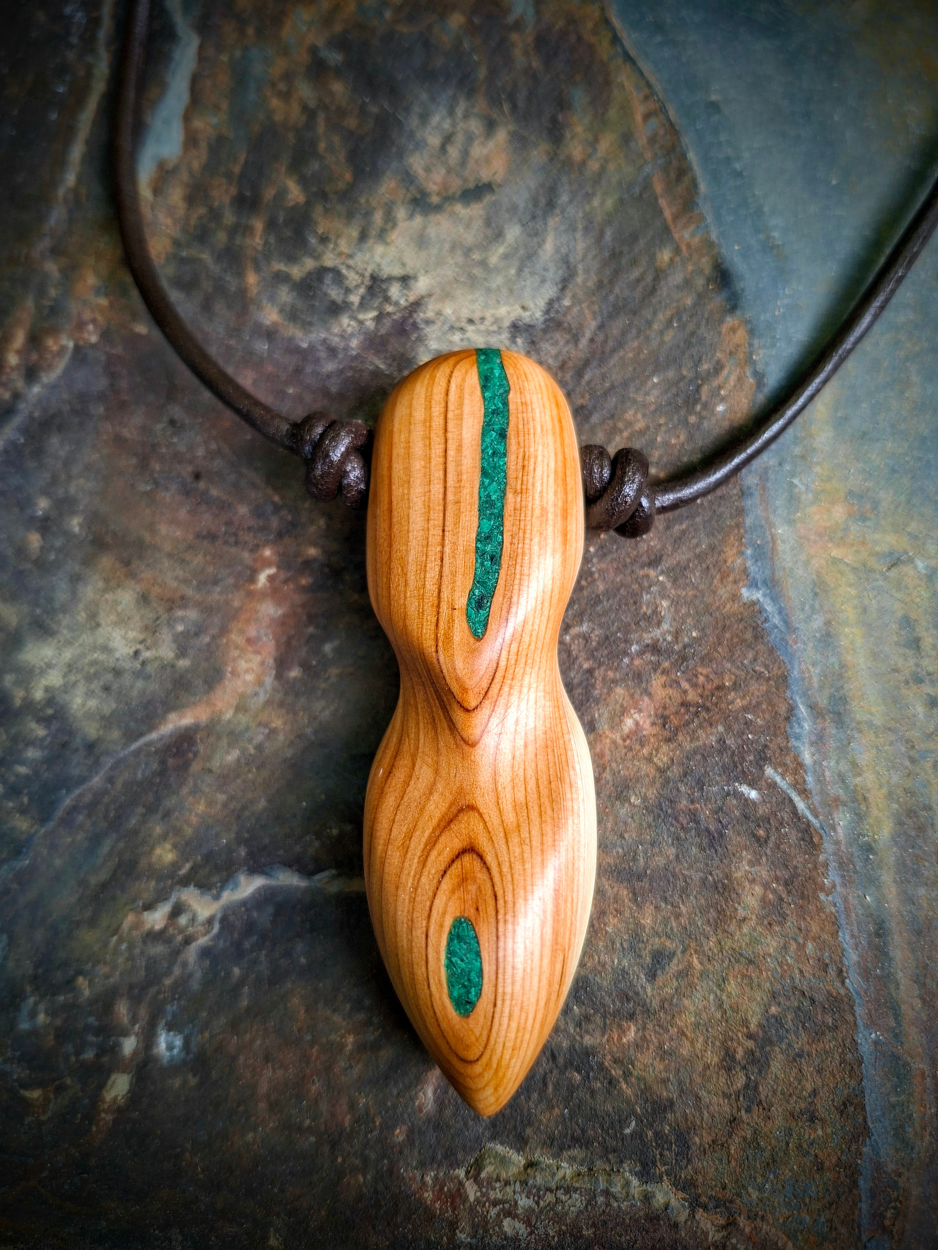 Whakaaro wooden necklace with malachite inlays