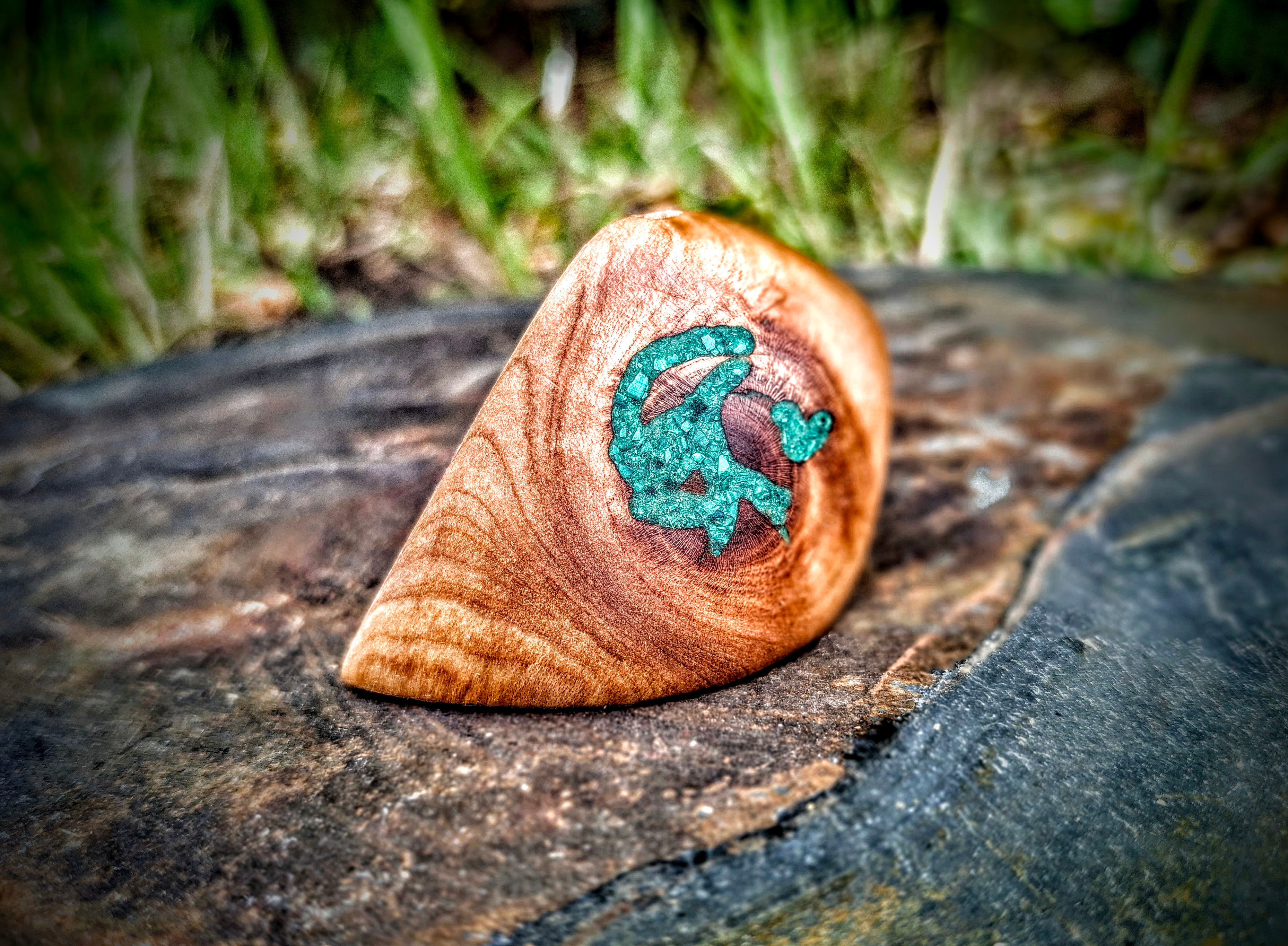 Whakaaro wooden holder with malachite inlays