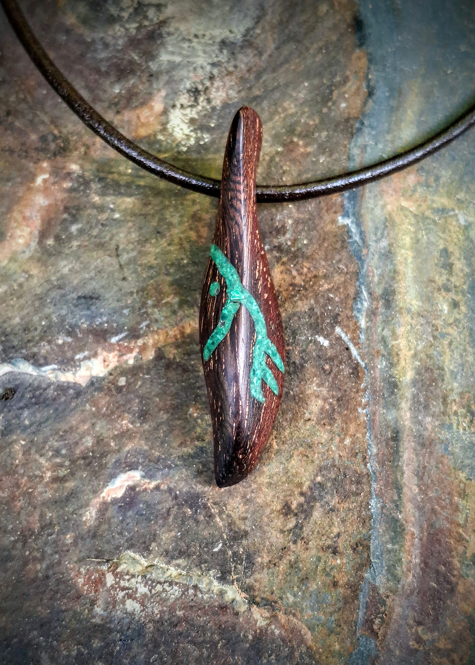 Whakaaro wooden necklace with malachite inlays