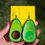 Thumbnail: Handmade hand painted avocado fruit green and brown dangle and drop statement earrings with yellow earring holder