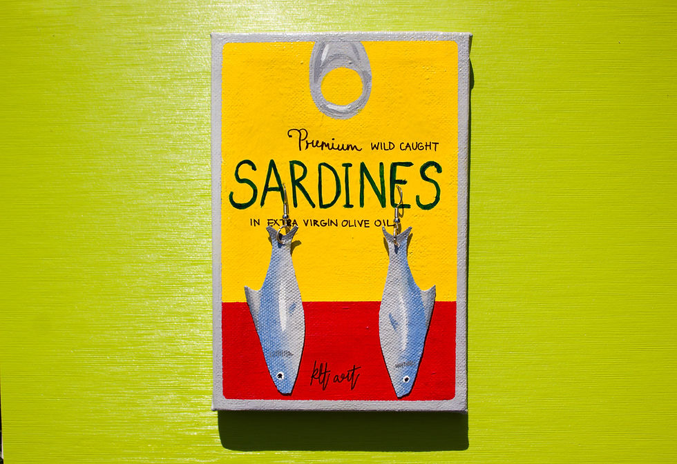 Handmade colorful kitschy tinned fish earrings of sardines with a unique tin earring display holder