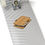 Thumbnail: Kiss-cut sticker of a s'mores dessert with graham crackers, chocolate, and marshmallows on a board. Sticker is non waterproof