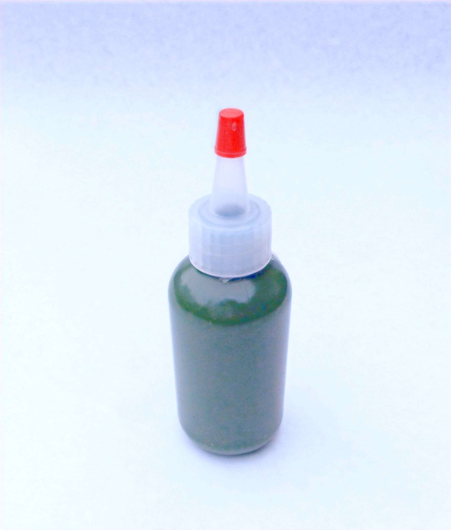 Two oz mud refill bottle.