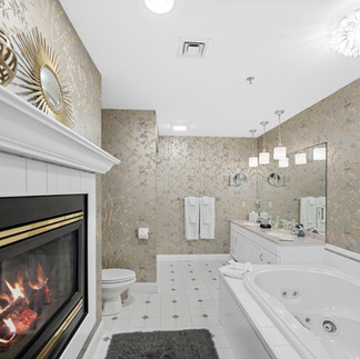 Luxury bathrooms in Stowe Vermont - double-sided fireplaces and jacuzzis for two