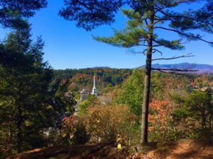 Views of the church steeple in Stowe from mountain trails