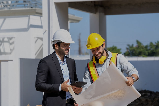 Engineer and businessman planning new residential subdivision home building in constructio