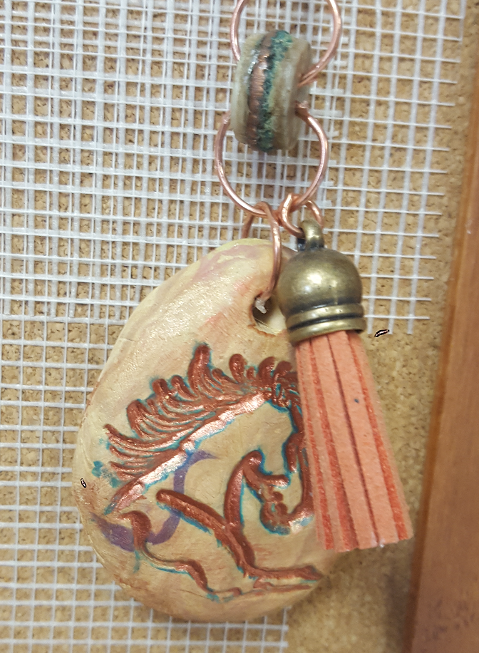 clay horse pendant with tassle