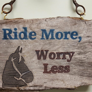 Ride More, Worry Less Sign