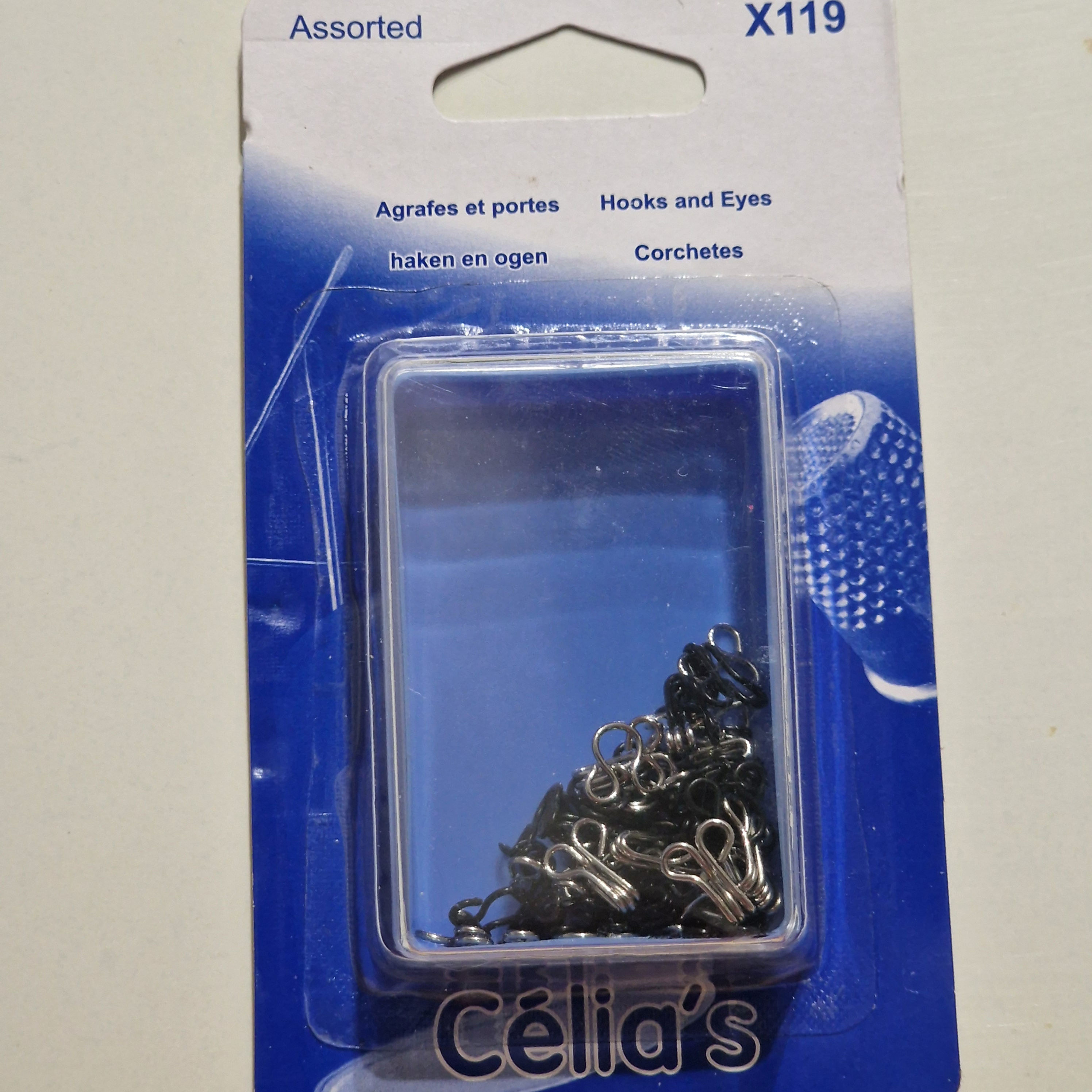 Crochet métal à coudre assortis