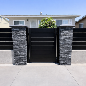 Installation & finished projects
Installation crew setting aluminum fence panels along a sidewalk.
Newly installed aluminum fence framing a landscaped front garden.
Before-and-after: replaced wooden fence with low-maintenance aluminum fence.