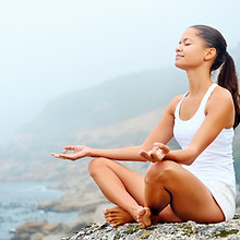 Woman Meditating Outdoors