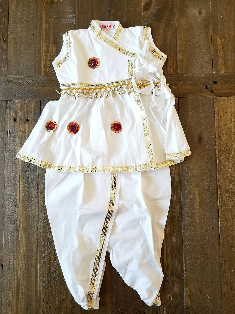 Thumbnail: Elegant white kedia with golden border (Red Sequins)