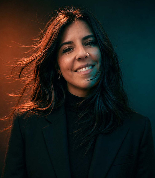 Professional portrait of Ximena Lopez with cinematic teal and orange lighting